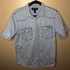 Distressed denim shirt